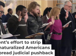 Dozens of immigrants from 18 nations take the oath to become U.S. citizens on Jan. 27, 2025, in Topeka, Kan. AP Photo/John Hanna